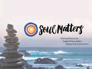A picture of rocks stacked near water with the words Soul Matters