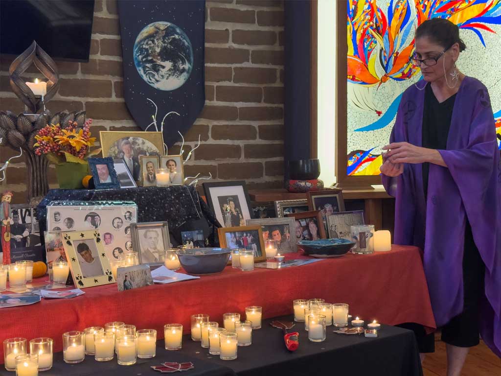 image of minister lighting candles