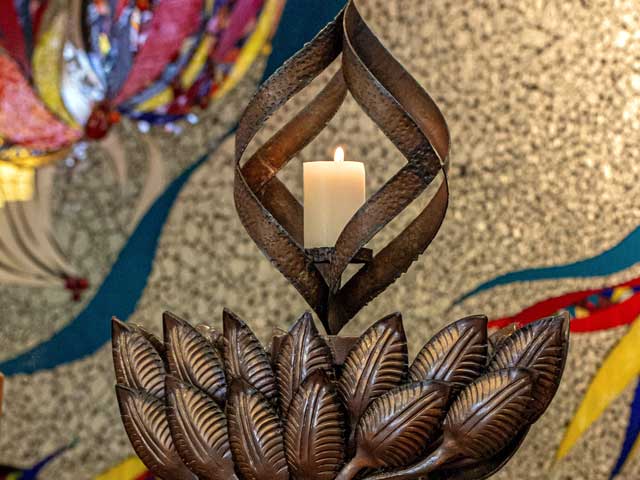 Image of chalice with lit candle